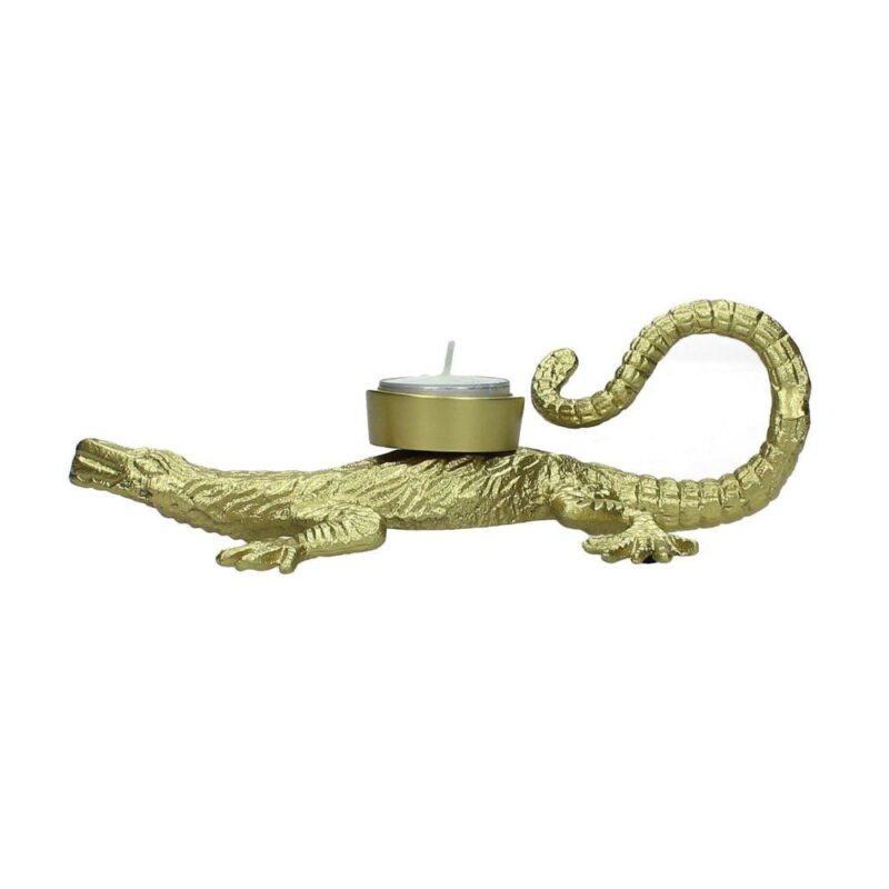 Unik värmeljushållare i form av en krokodil – tillverkad i guldfärgad aluminium. En charmig inredningsdetalj som lyfter både middagsbordet och humöret. Mått: 22 x 11 x 7 cm.