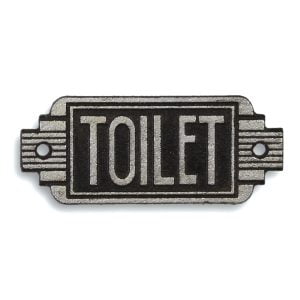 Skylt i bemålat gjutjärn i vacker Art Deco stil med texten Toilet. Mått 14,5x6 cm (lxh).