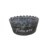 Blomkruka i metall. Mått: 10x25 cm (hxdia).