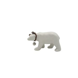 Dekorativ isbjörn i porslin. Mått: 6x11 cm (hxl).