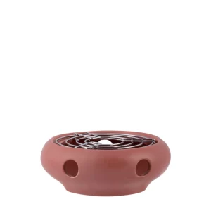 Superpraktisk terracottaröd varmhållare för tekannan från danska PLINT, med plats för värmeljus. Perfekt för att hålla teet varmt vid bordet. Material: keramik och rostfritt stål. Mått 7x15 cm (hxdia). Värmeljus medföljer ej.
