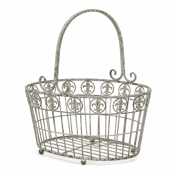 Metallkorg med dekorativa detaljer och öppen form. Perfekt för plädar, tidningar och småförvaring som du vill ha nära till hands.